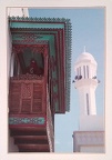 Bahrain-balcony-set-against-the-minaret-of-a-mosque